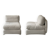 2 Italian off-white chenille armchairs with wooden base, 1970s design.