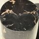 Small side table in black petrified wood with stripes and beige bottom H28.