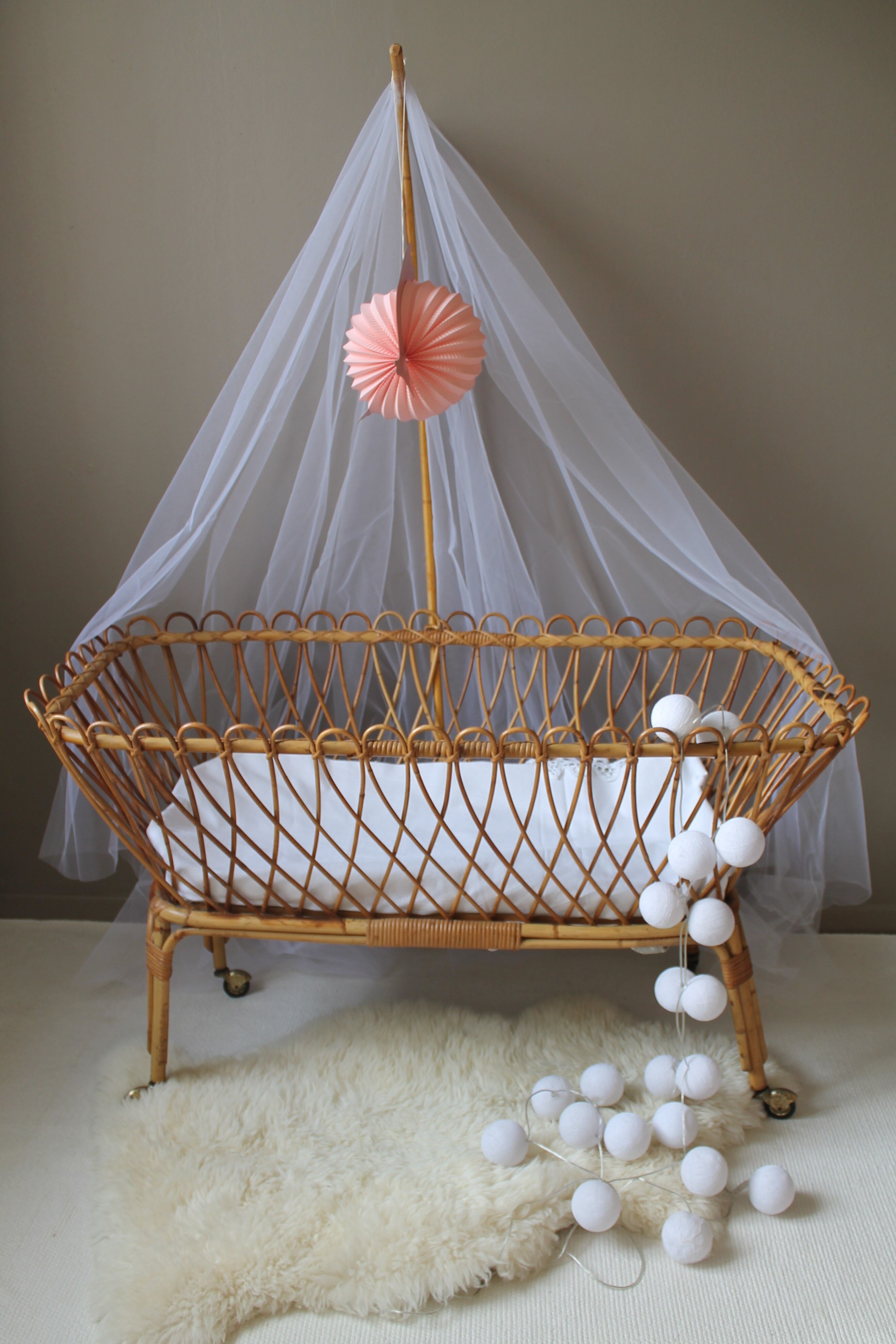 Vintage rattan cradle