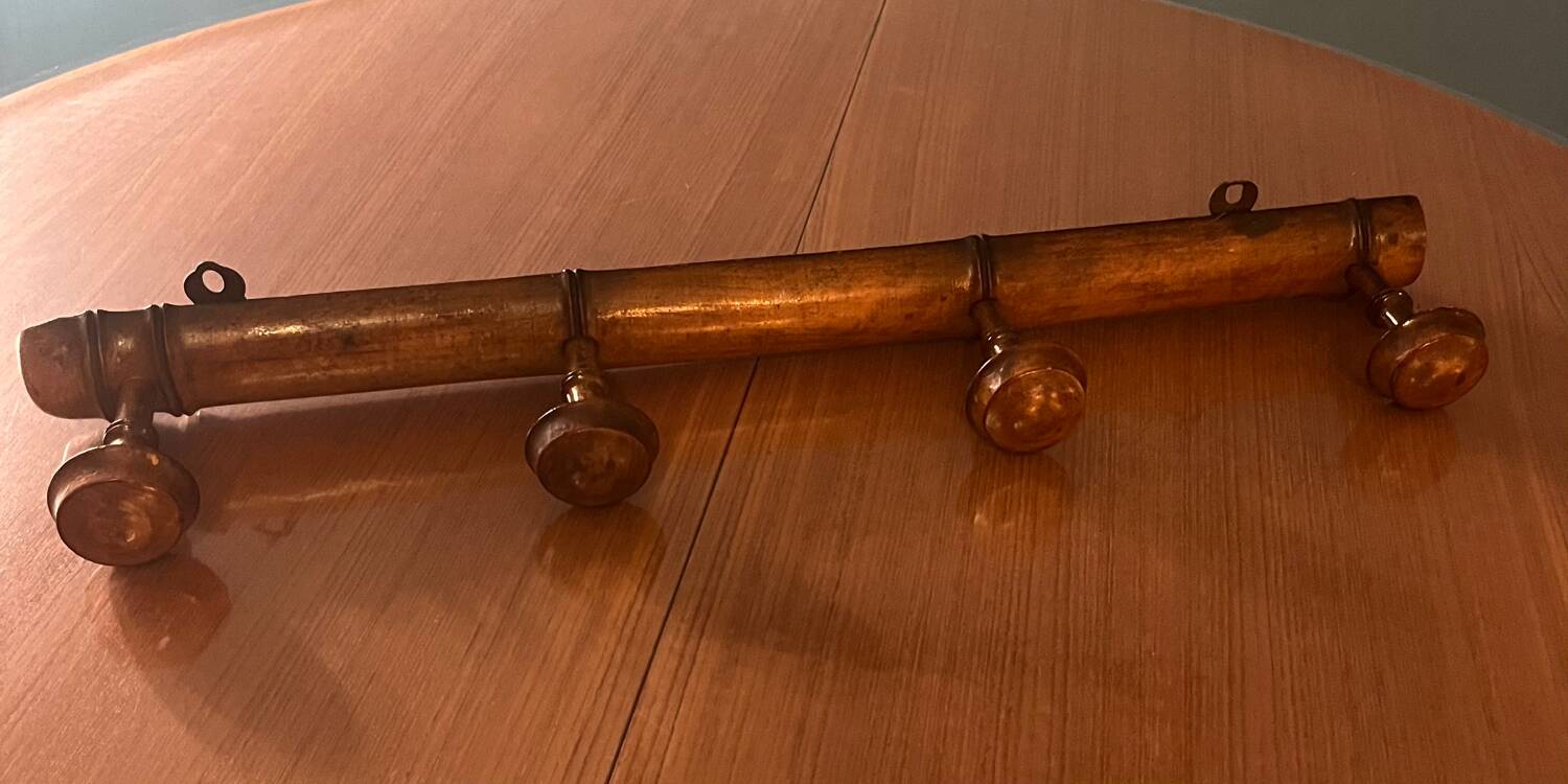 Old wooden wall coat rack