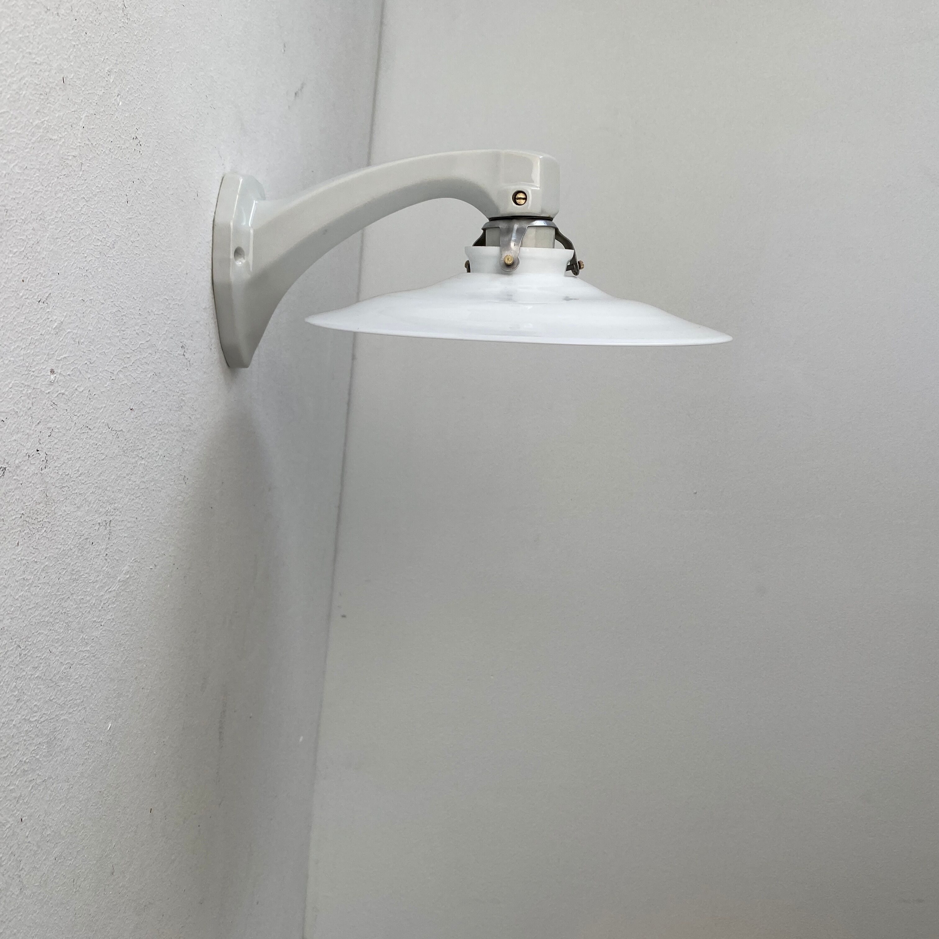 Old ceramic and opaline vintage wall lamp