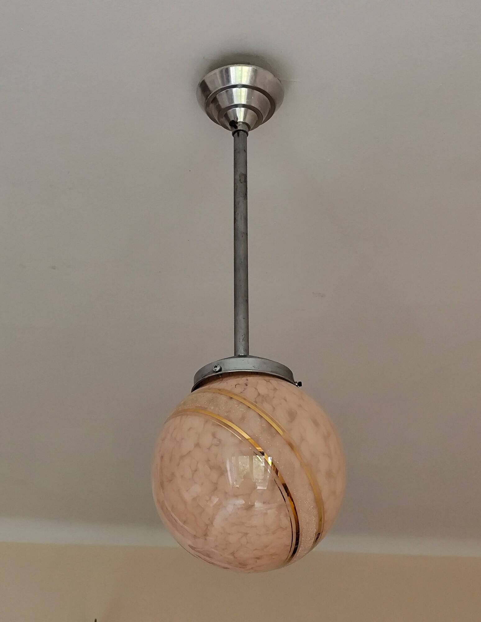 suspension glass globe pink and gold on a metal aluminium stem and structure