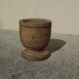 Turned solid wood flowerpot