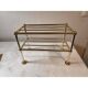1900 shop shelf in bronze and brass