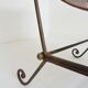 Paire de fauteuils en fer forgé et cuir vintage