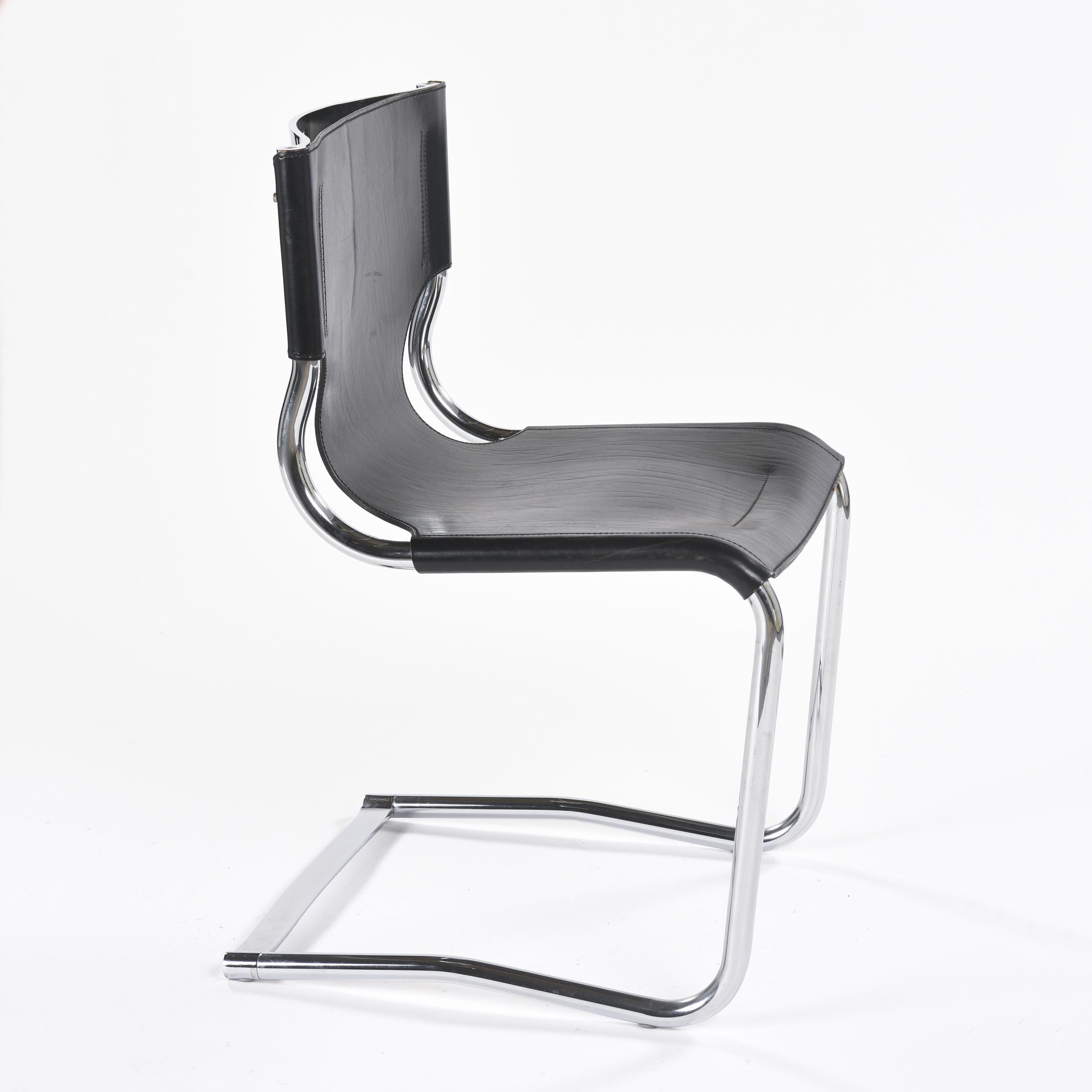 Black leather chairs by Carlo Bartoli