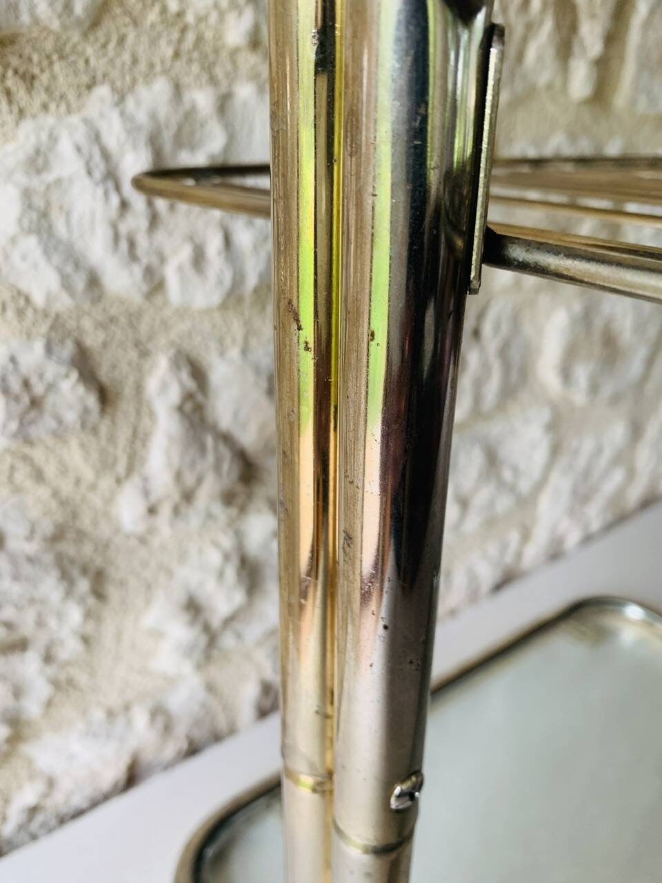 Glass and brass side table with magazine rack, circa 1970's