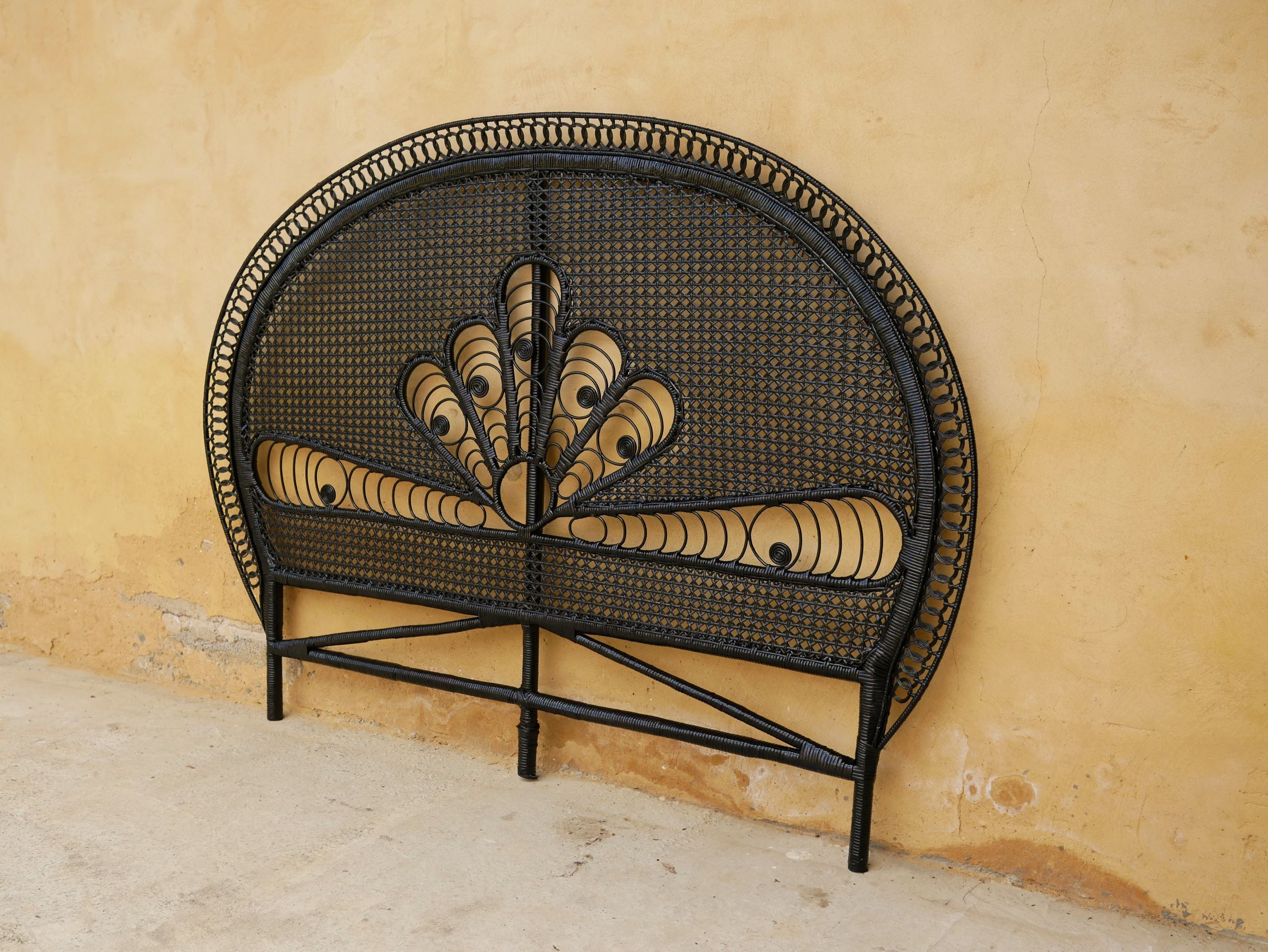 Vintage headboard in black rattan