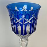 Set of twelve glasses in crystal tinted in different colours and cut with stars.