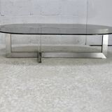 Coffee table with steel base and smoked glass slab. Circa 197