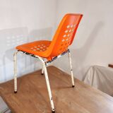 Chair with openwork plastic shell 1970