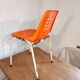 Chair with openwork plastic shell 1970