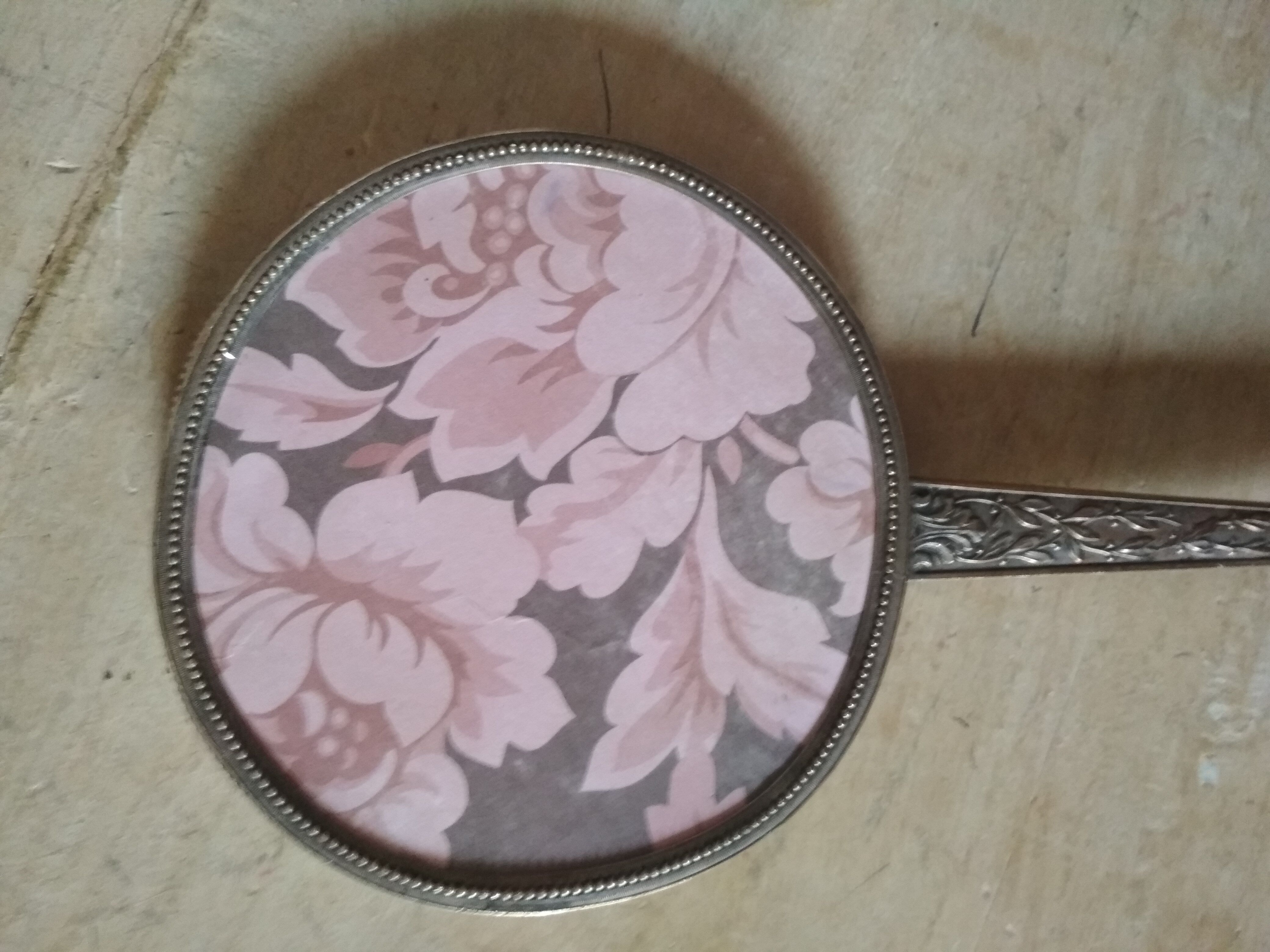 Old hand mirror beveled glass