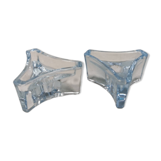 Two beautiful glass candle holders in translucent bluish glass.