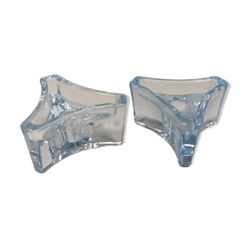 Two beautiful glass candle holders in translucent bluish glass.
