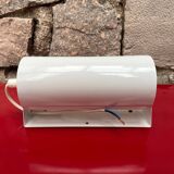 Metal wall light with shutter