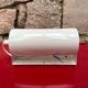 Metal wall light with shutter