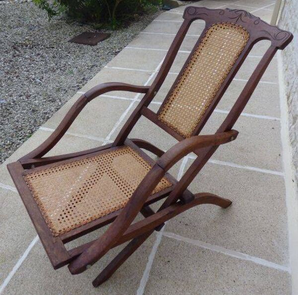 Fauteuil ancien pliant assise et dossier cannés en bois