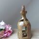 Old candle holder lantern in pyrite sandstone, decorative lantern
