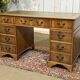 English flat desk with drawers from the 1970s in fir and leather top.