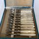 12 dessert forks in steel and mother-of-pearl