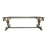 Gold metal and glass coffee table attributed to the BAGUÈS house.