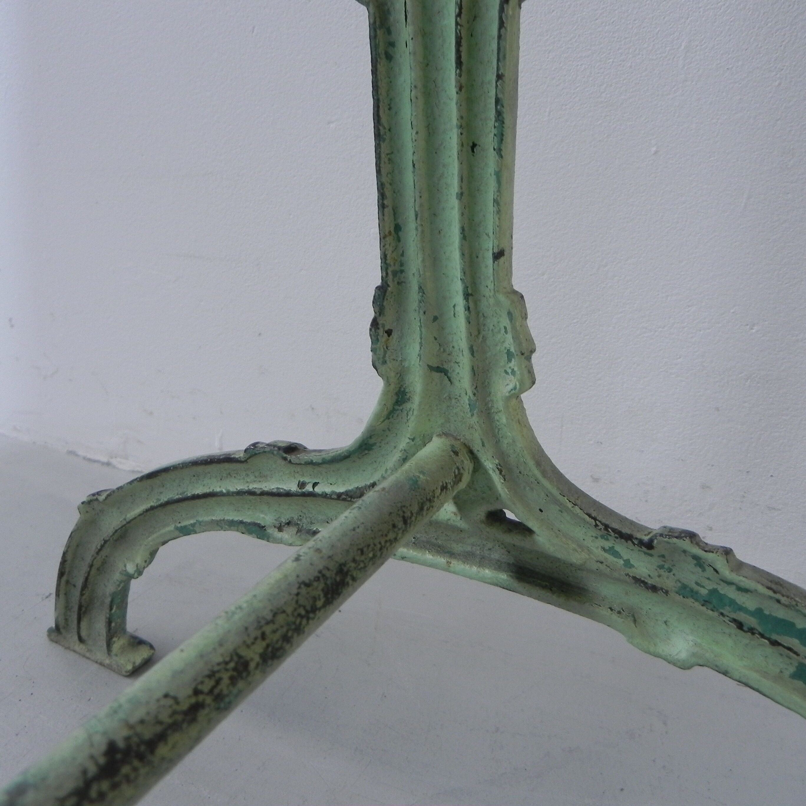 Art nouveau bistro table with cast iron frame