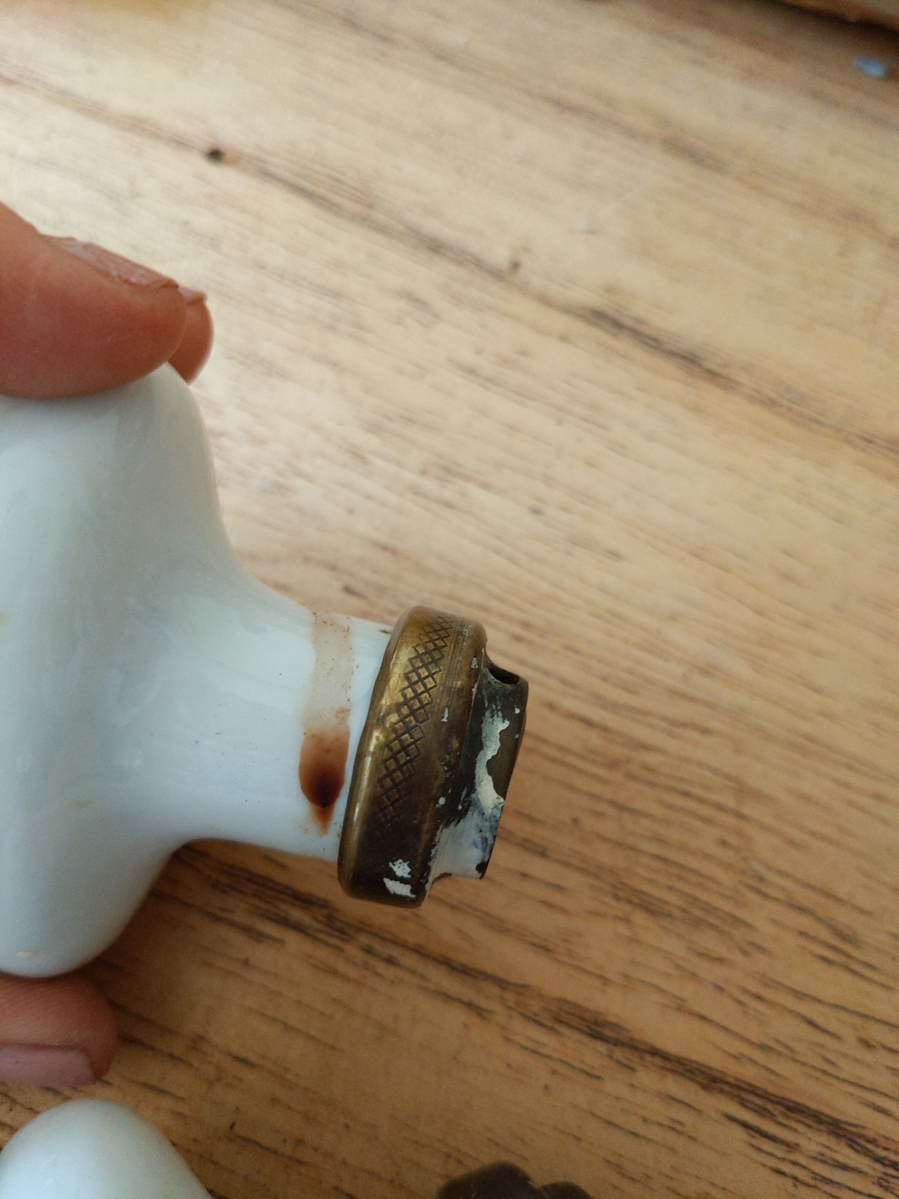 Vintage antique door handle in porcelain and brass