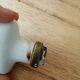 Vintage antique door handle in porcelain and brass