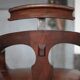 Barber chair in wood and leather with adjustable headrest, office chair.