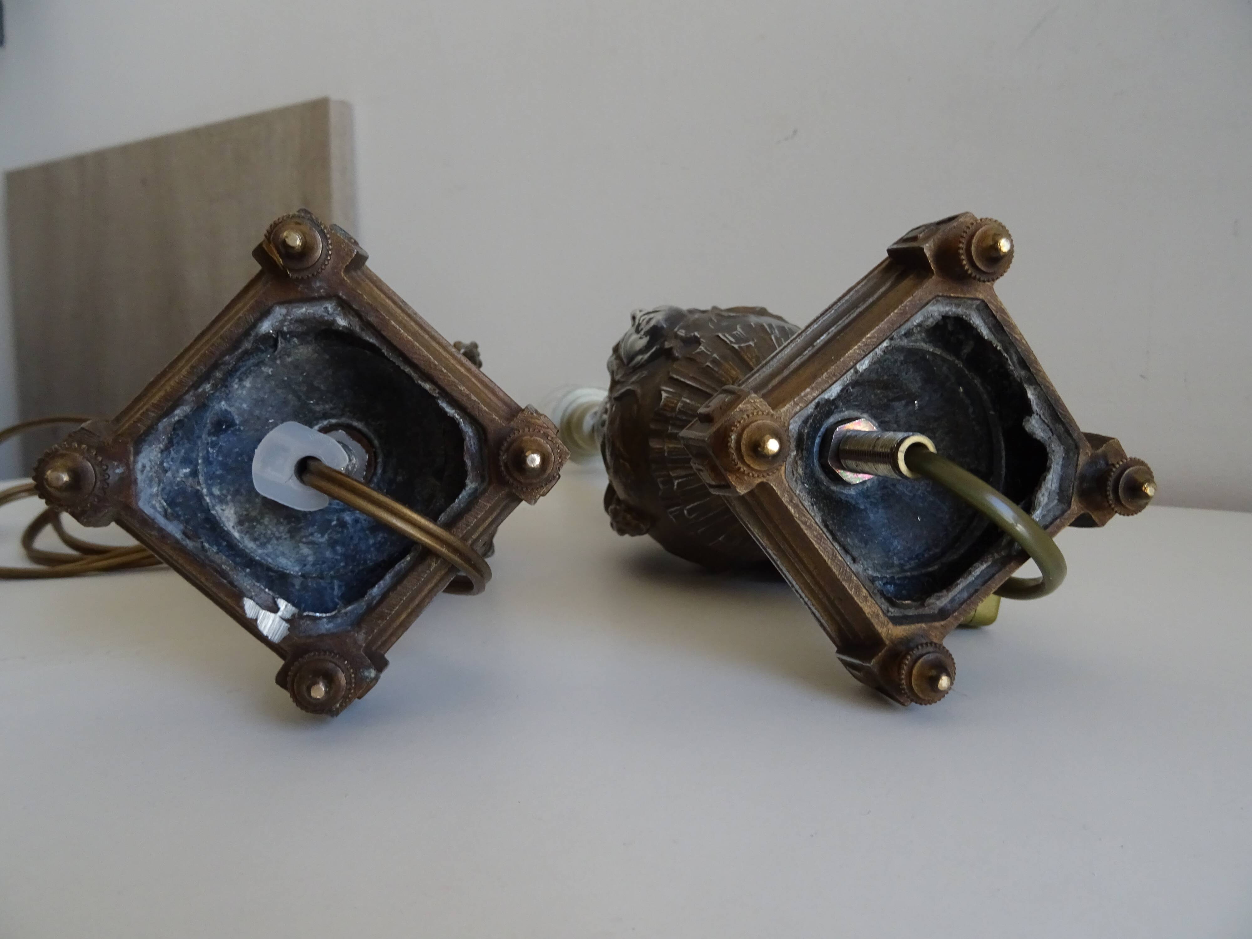 Pair of Louis XVI style lion and cherub decoration lamps