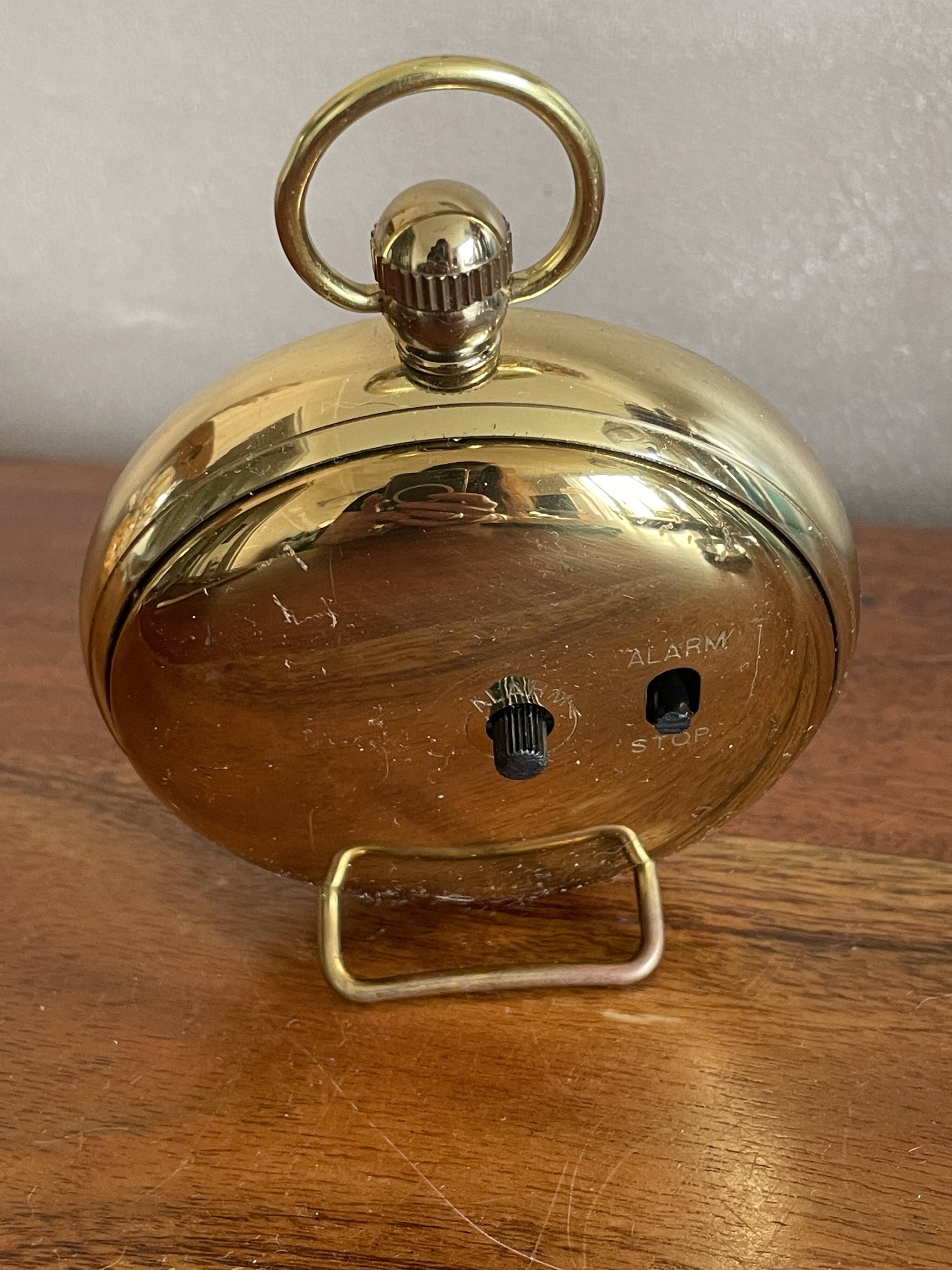 Lancel alarm clock pocket shape