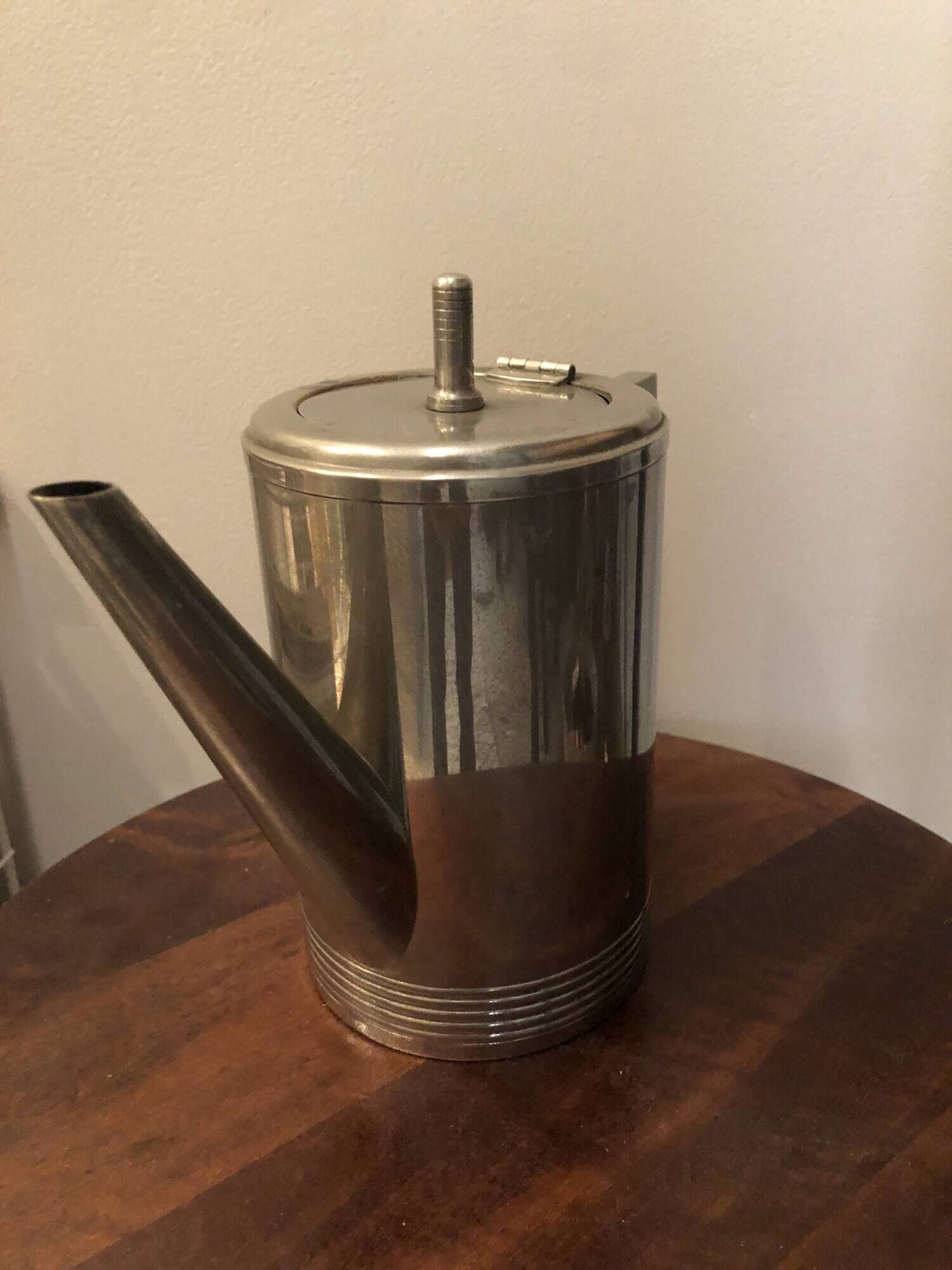 Stainless steel teapot in Art Deco style