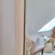 Miroir biseauté et mouluré beige