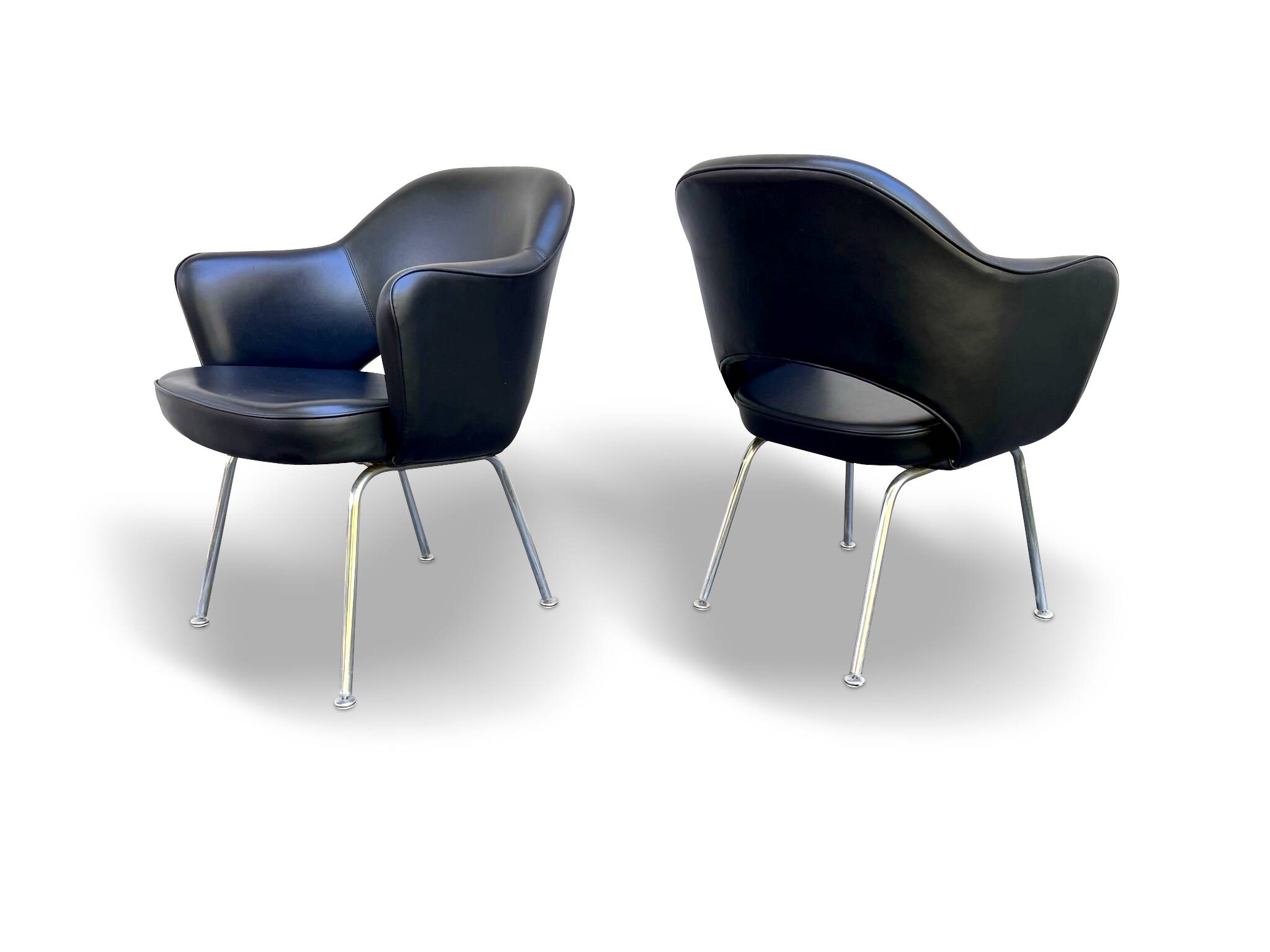 Pair of "Conference" armchairs by Eero Saarinen for Knoll International, black and chrome