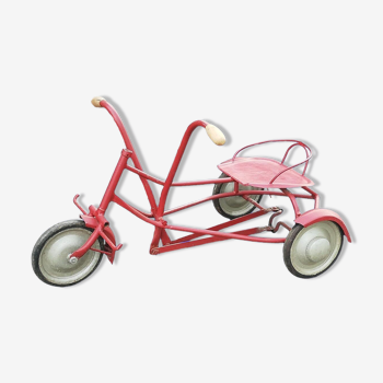 Old cyclorower for children 50s vintage tricycle