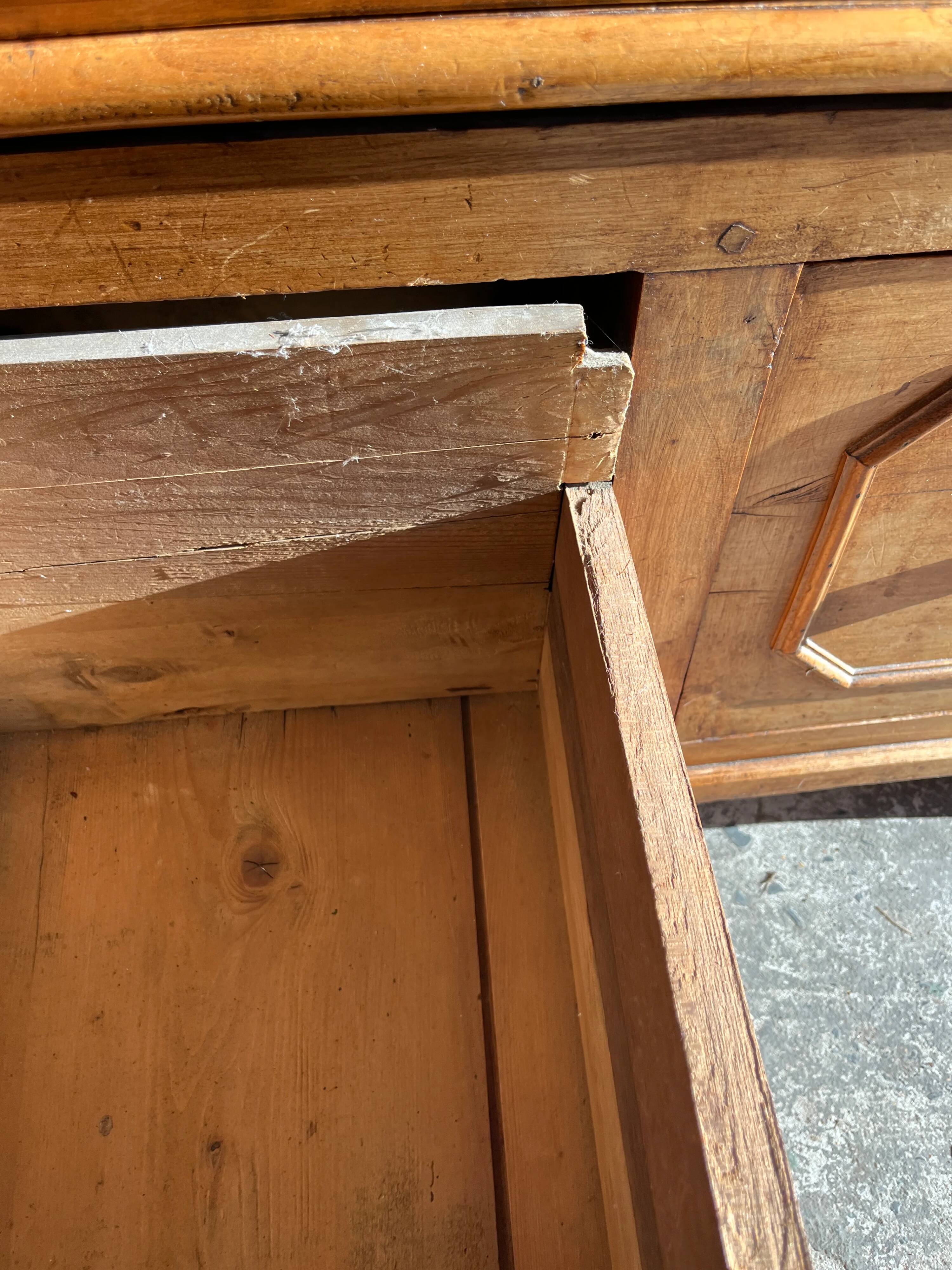 Old wooden baker's chest with storage drawers