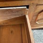 Old wooden baker's chest with storage drawers
