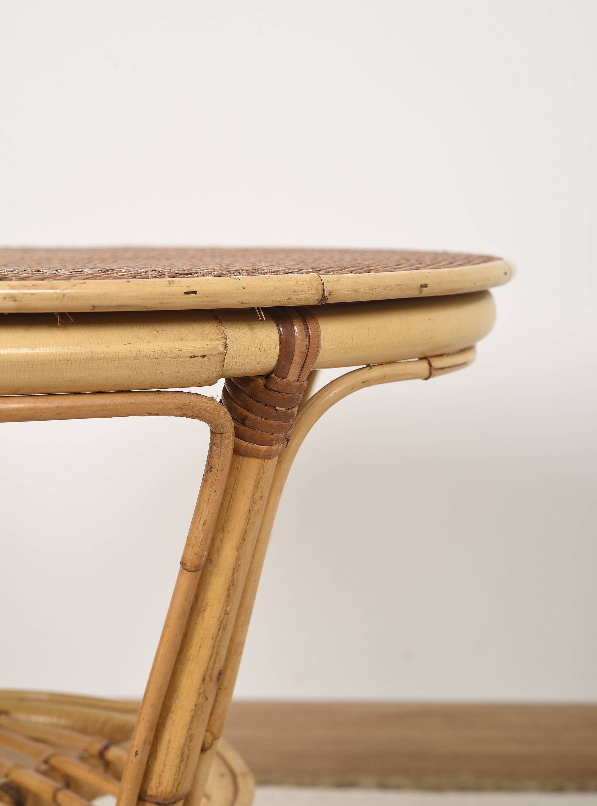 Old round rattan table, vintage from the 70s - 80s. Small table, or side table.