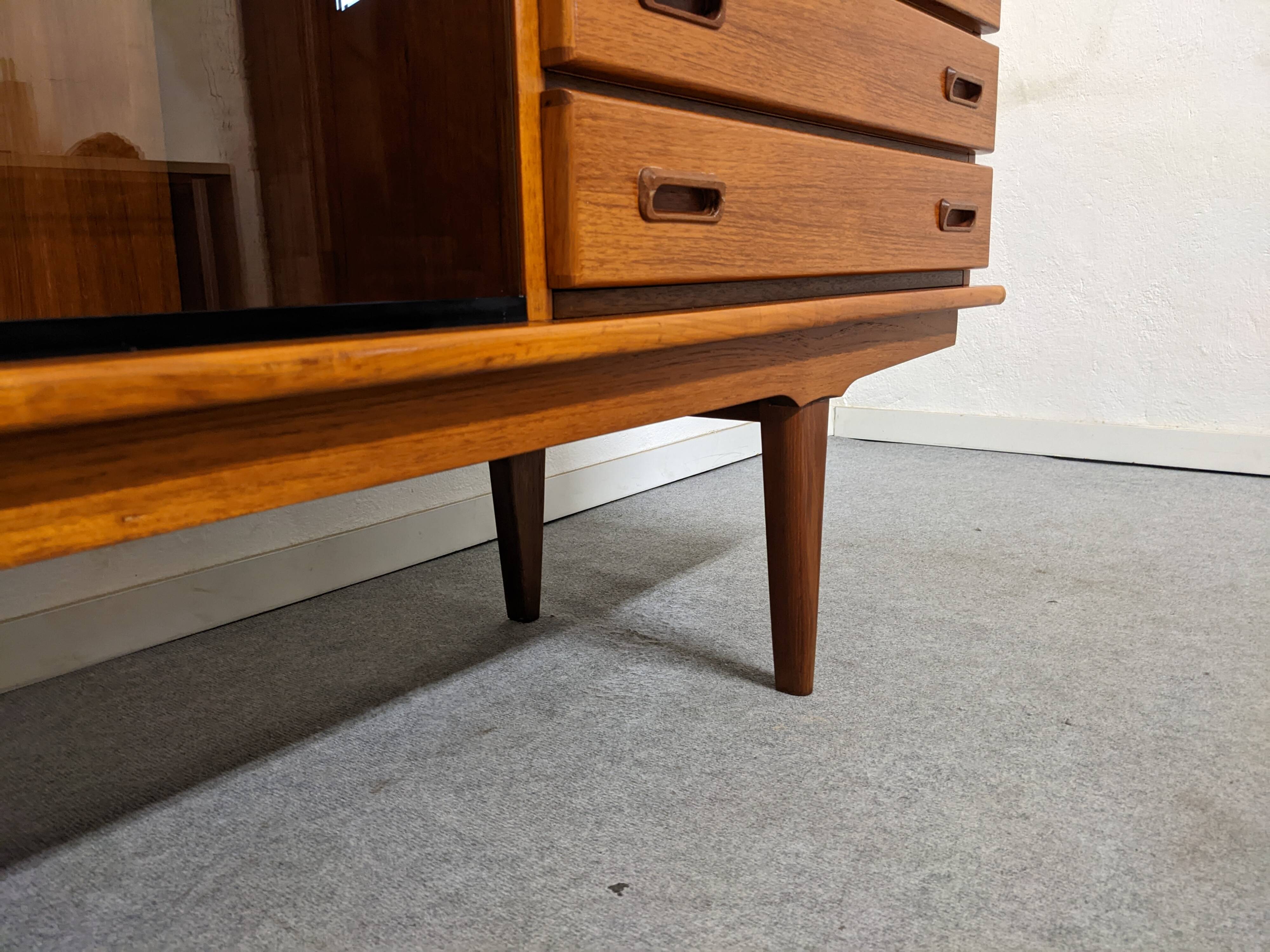 High sideboard, display cabinet and secretary, Scandinavian in teak, France around 1960.