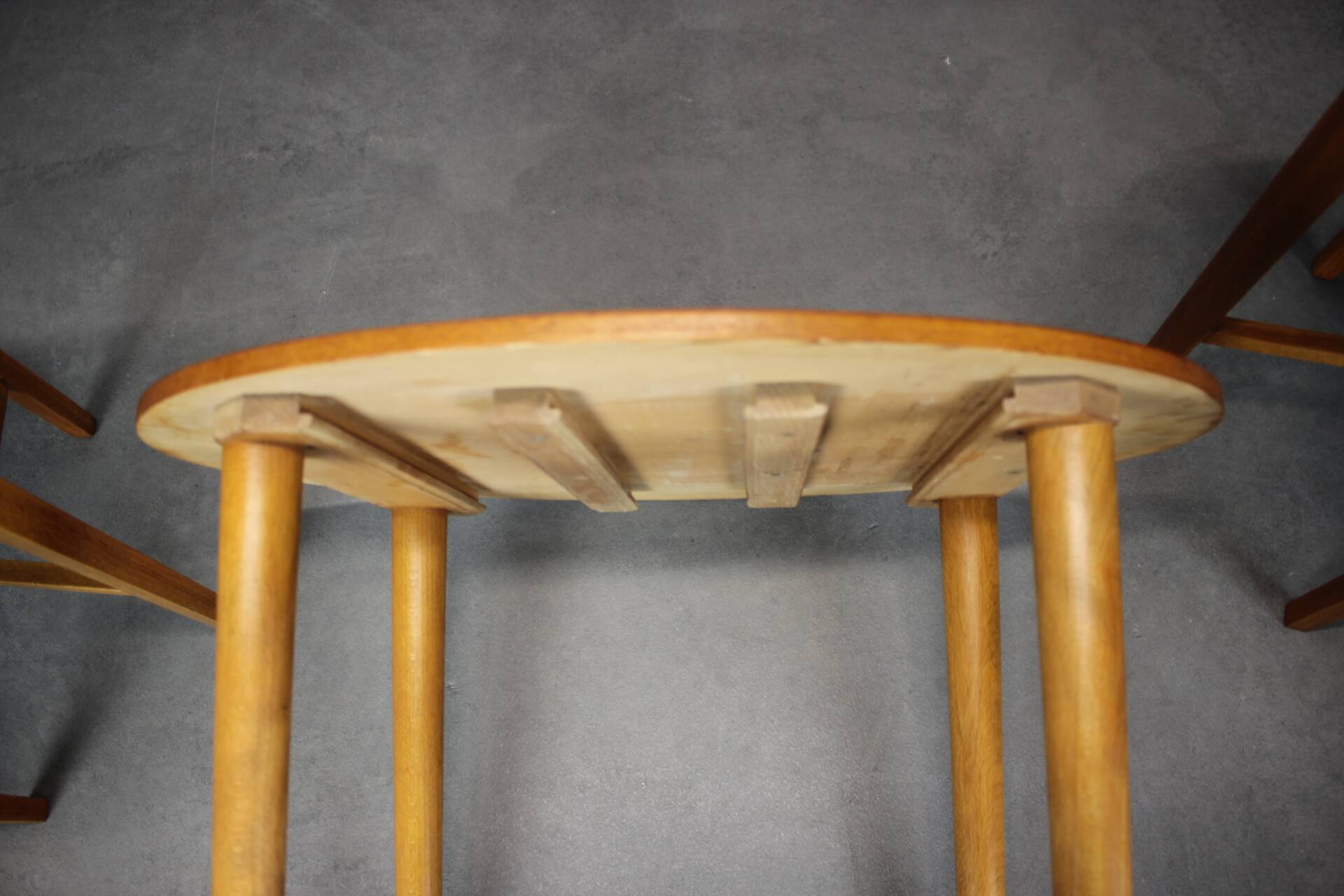 Restored Danish folding teak table with three nesting chairs by Poul Hundevad