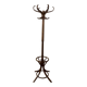 Antique curved wooden coat rack with umbrella stand.