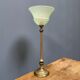 Ornate brass table lamp with mint green glass shade