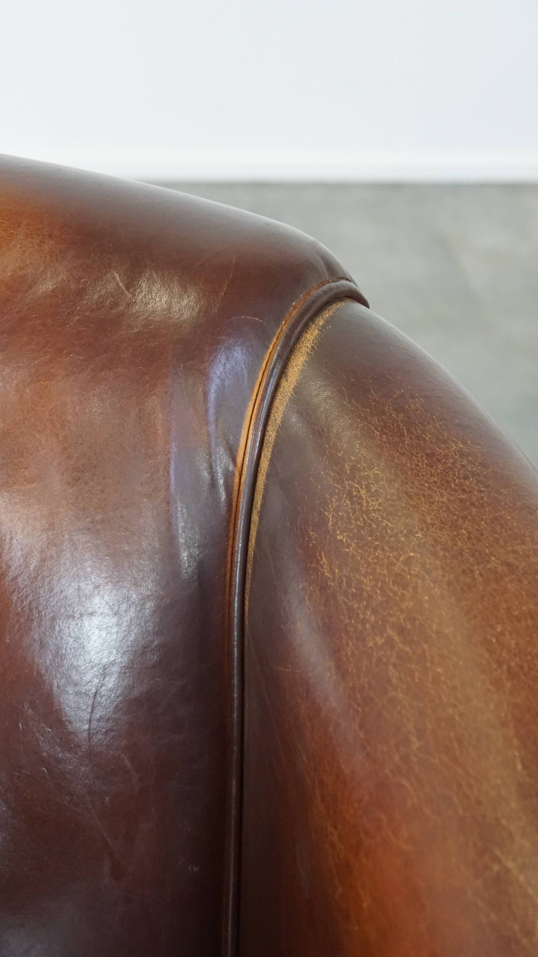 Vintage club armchair made of sheep leather