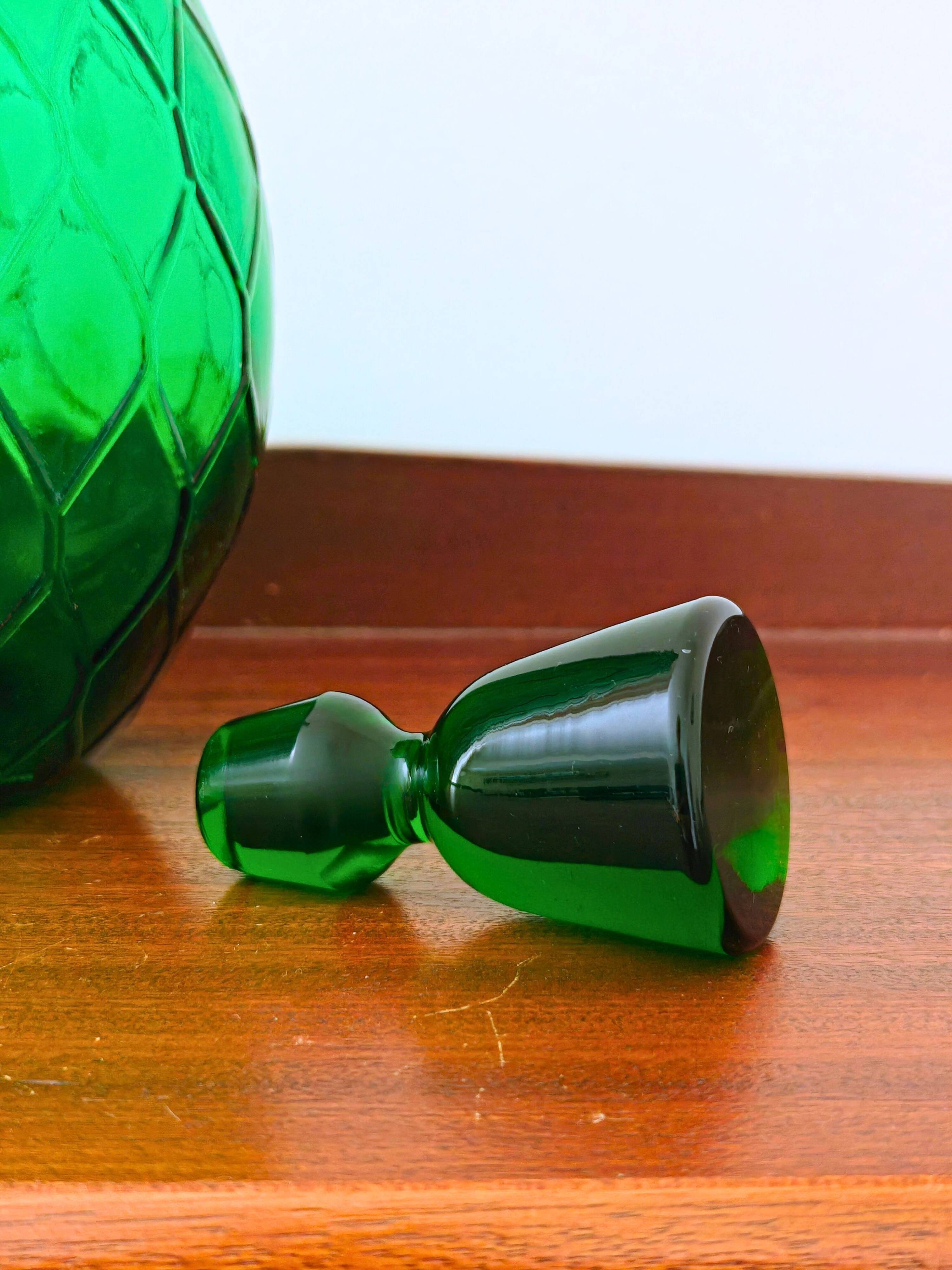Italian carafe Empoli in iridescent green with diamond pattern.