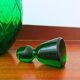 Italian carafe Empoli in iridescent green with diamond pattern.
