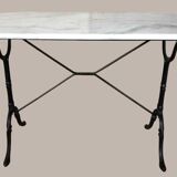 Oval marble and cast iron bistro table