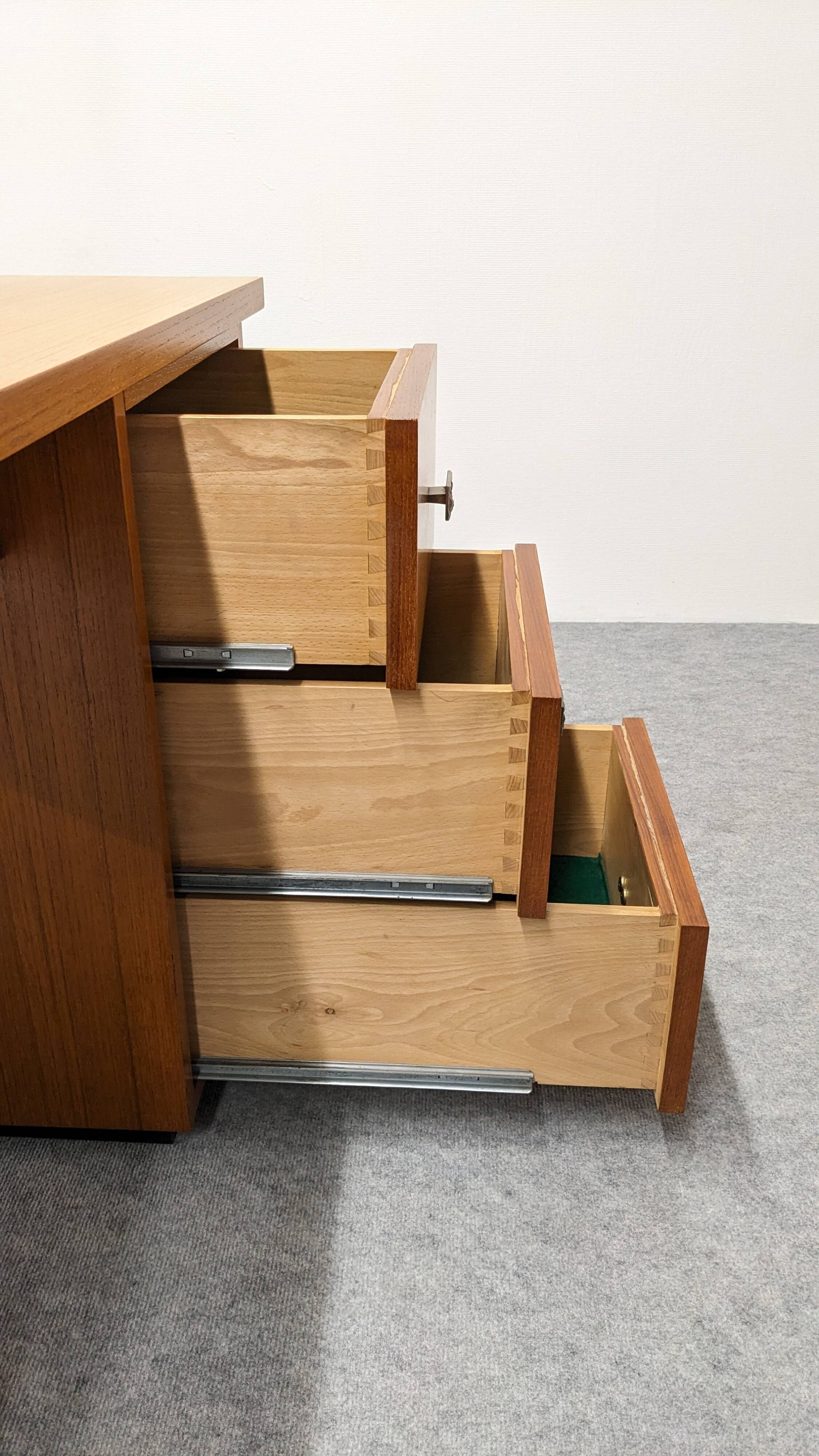Modernist desk in blonde rosewood, France circa 1960.