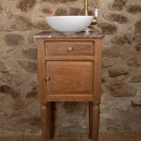 Small antique washbasin in wood and red marble.
