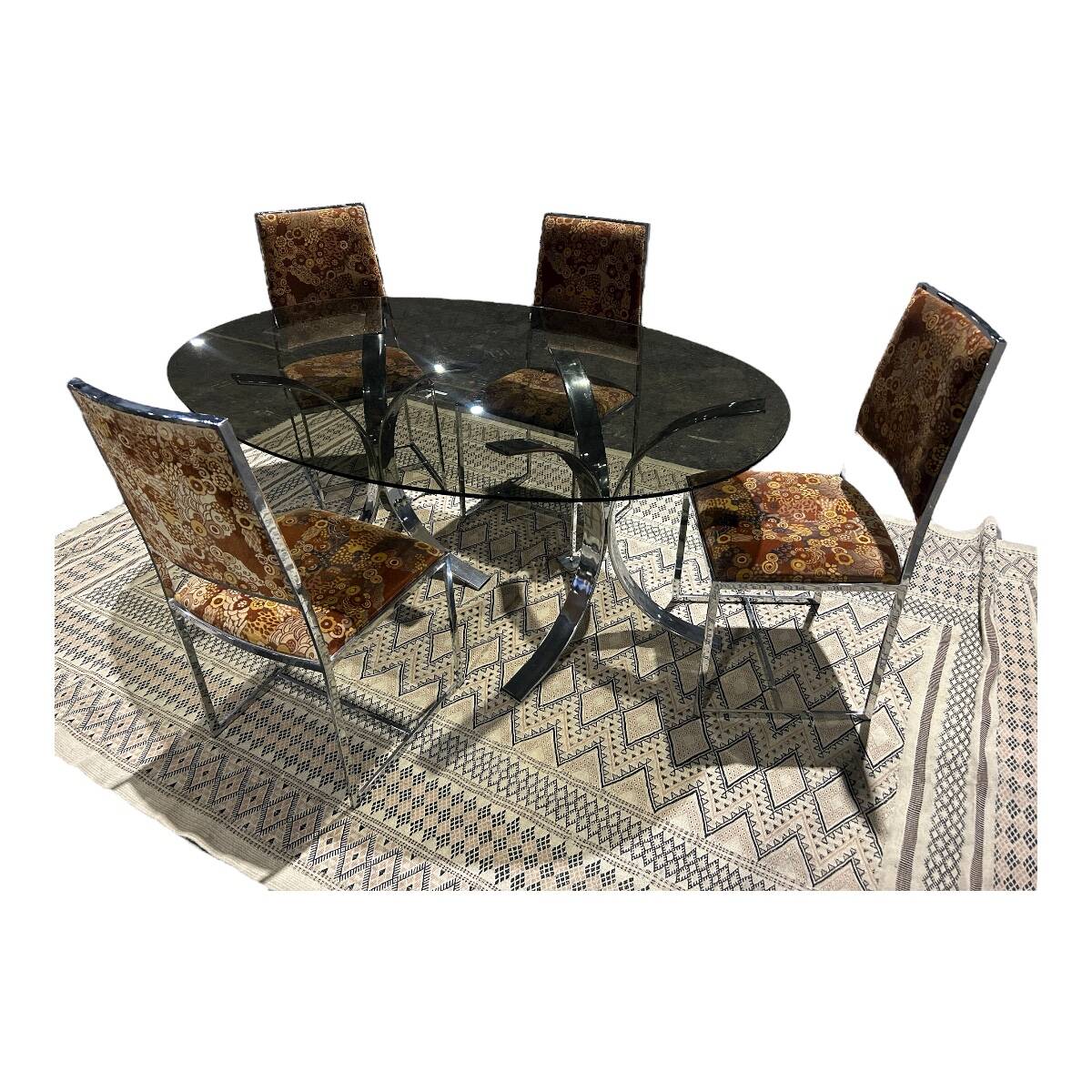 table en verre fumé et pieds en métal chromé